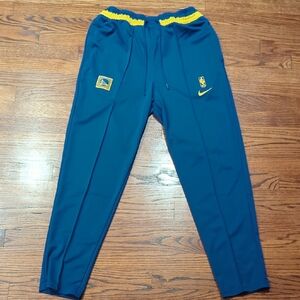 Nike Blue Joggers with Yellow Details